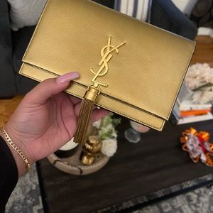 Gold ysl on  a chain